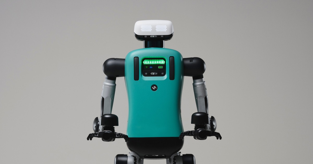 Agility Robotics Digit humanoid robot with a teal torso and white head unit, shown from the waist up against a plain grey studio background