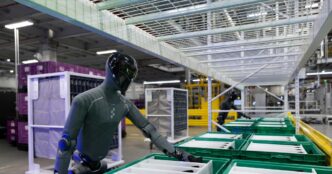 Figure 03 (F.03) humanoid robot at BMW Group Plant Spartanburg reaching into a parts bin