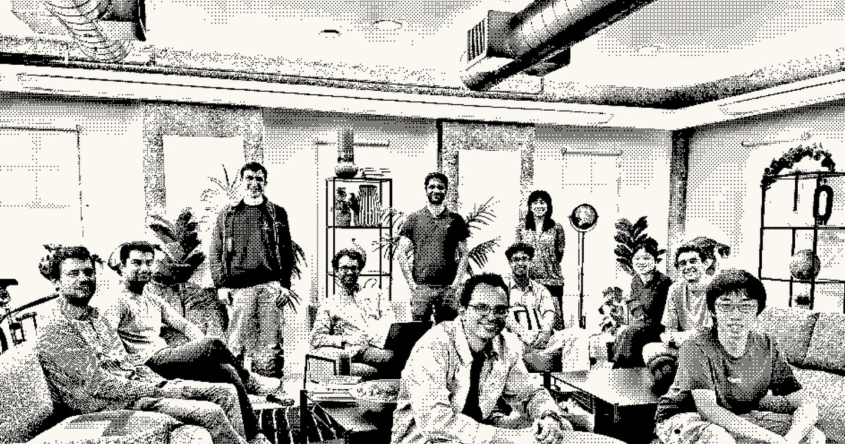 A dithered black-and-white group photo of about a dozen people sitting and standing in an office lounge, published on Inception's website