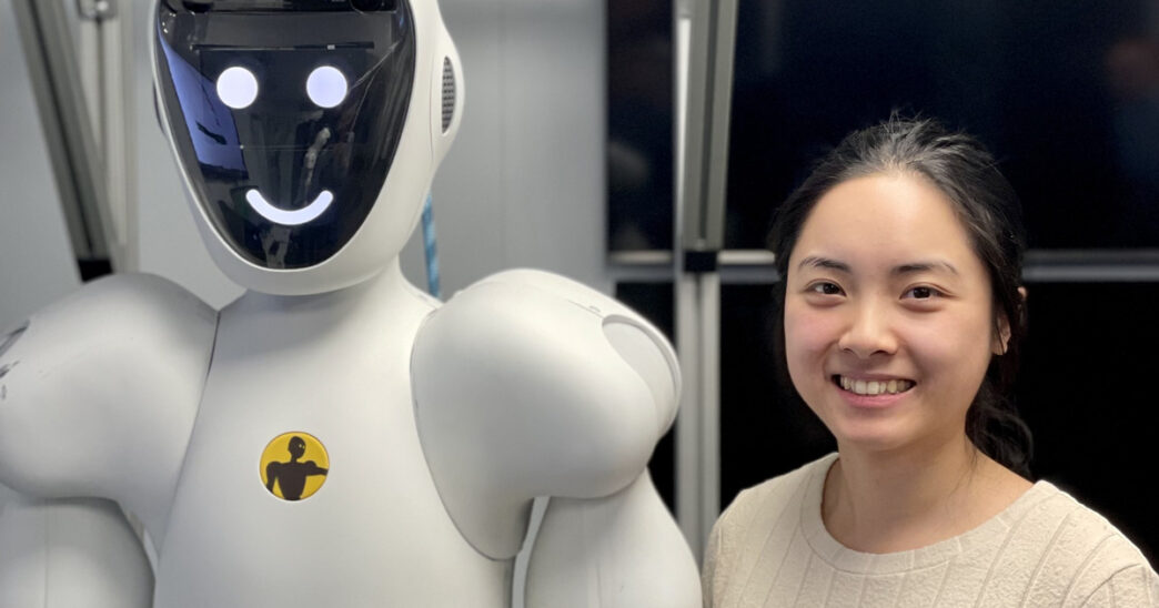 Halodi Robotics collaborative humanoid standing beside a perception engineer in a lab setting, both heads visible