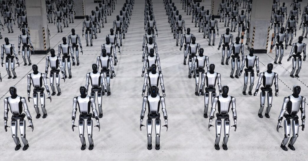 Rows of silver-and-black UBTech Walker S2 humanoid robots standing in formation on a grey concrete floor in a large hall