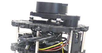 Top tiers of a TurtleBot3 Burger, a small tiered mobile research robot with a lidar scanner on top, against a white background