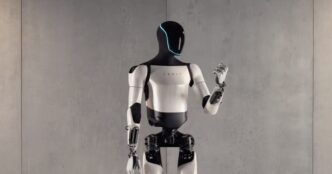 Tesla Optimus Gen 2 humanoid robot standing in a product studio pose