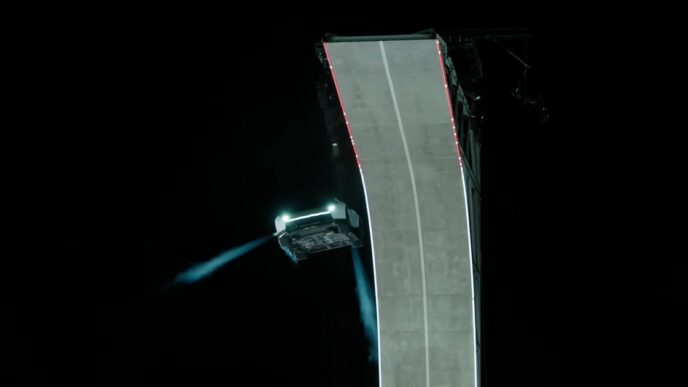 White Tesla Roadster in midair beside a curled concrete ramp at night, firing blue cold-gas thruster plumes during Tesla's October 15, 2026 reveal