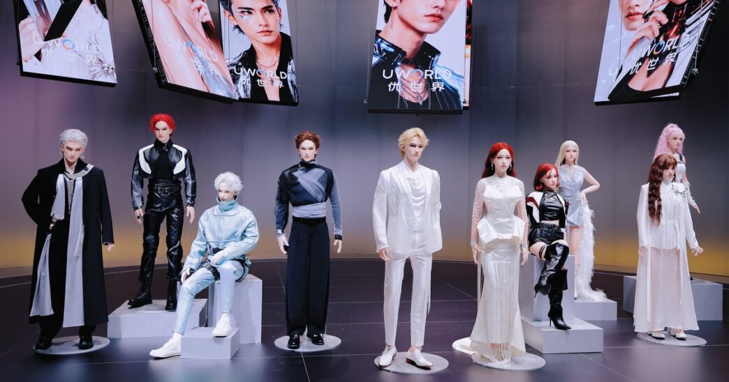 A row of lifelike UBTech UWORLD U1 humanoid robots in fashion outfits standing and sitting on display pedestals under UWORLD screens